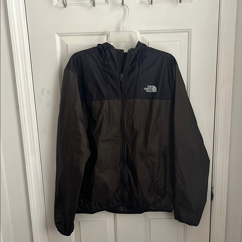 The North Face Black Windbreaker with Hood and Water-Resistant Fabric